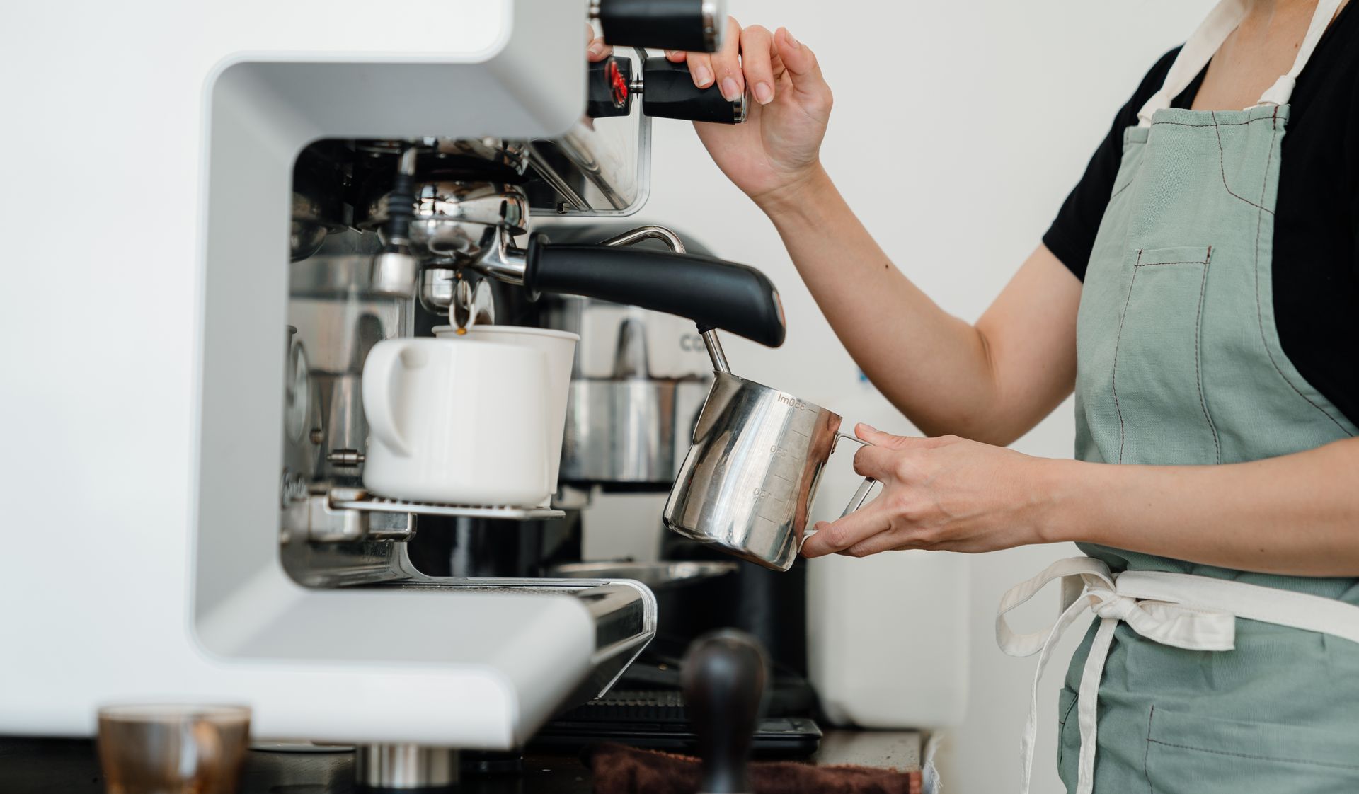 Espresso being pulled into a cup